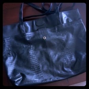 Unmarked large black shoulder bag